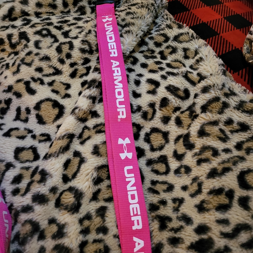 Under armour lanyards,  key chains.